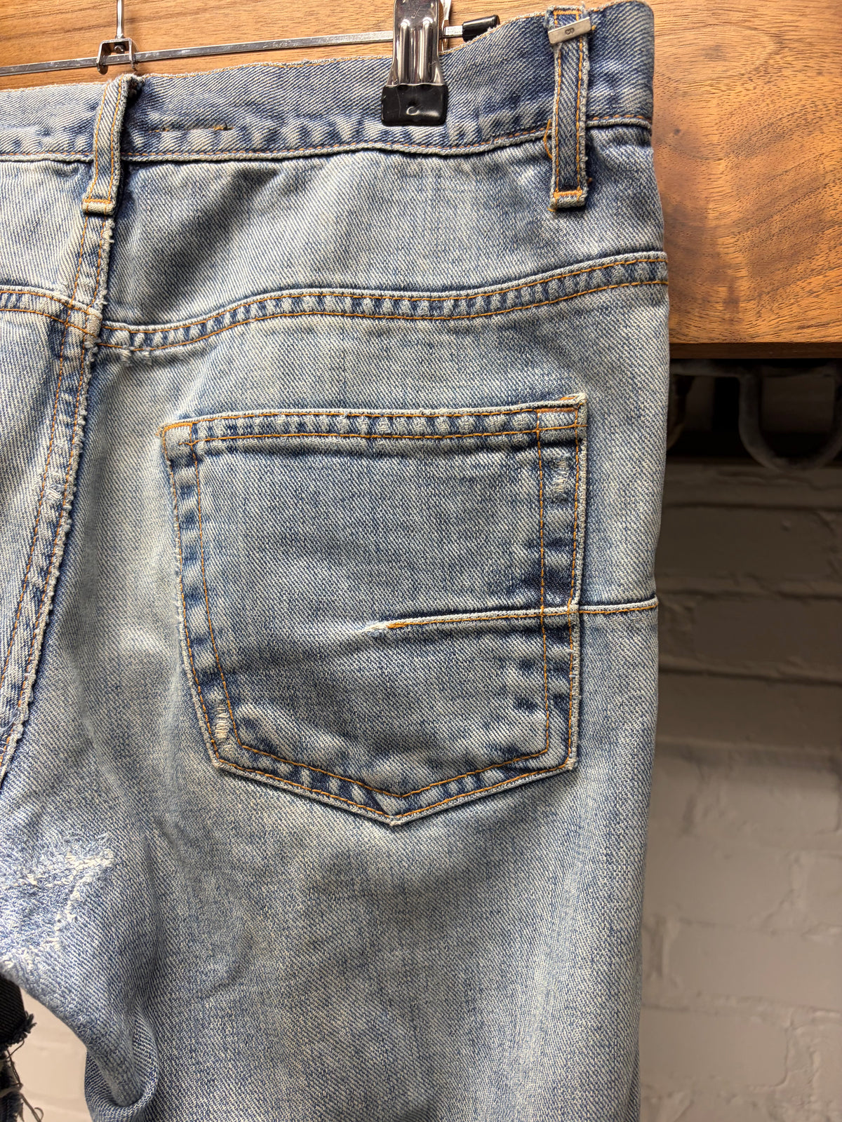 Dior Homme ‘Heavily Blowout Distressed’ Light Washed Blue Skinny Jeans