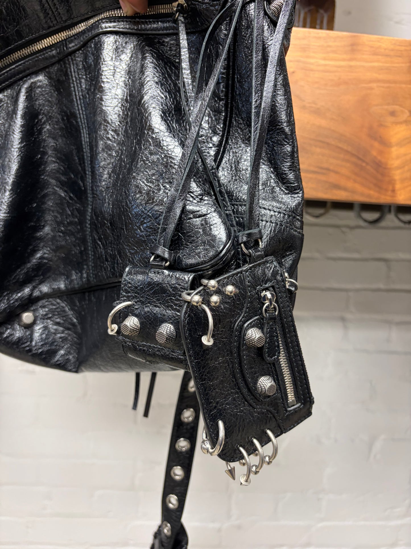 Balenciaga ‘Le Cagole’ Medium Size Pierced Black Leather Crossbody Messenger Bag