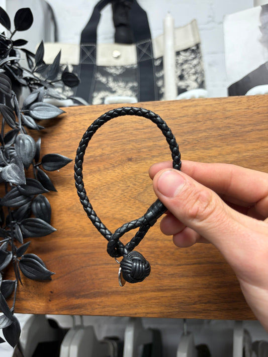 Bottega Veneta Woven ‘Intrecciato’ Black Leather Rope Bracelet with Charm