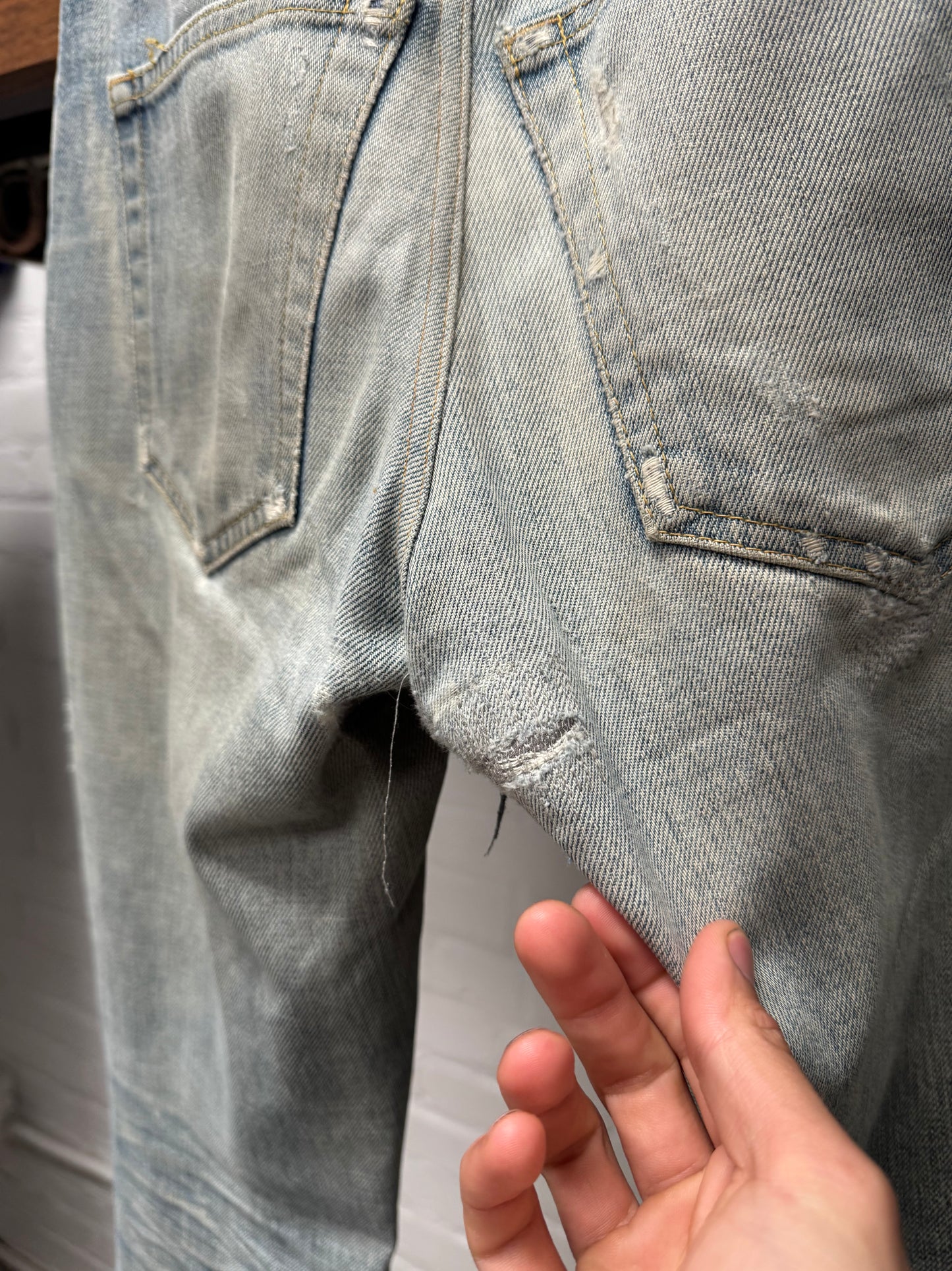 Saint Laurent ‘D02’ Distressed Light Wash Blue Skinny Jeans