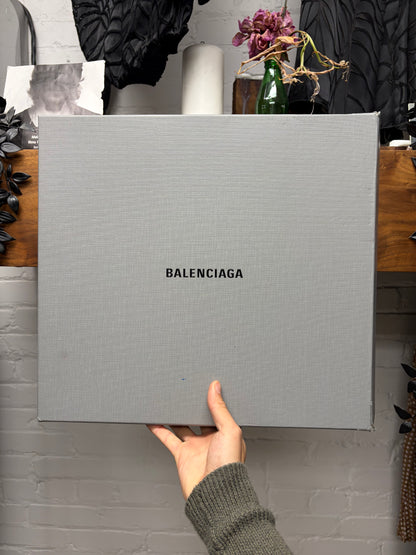 Balenciaga ‘Strike’ Piercing Distressed Black Leather Combat Boots