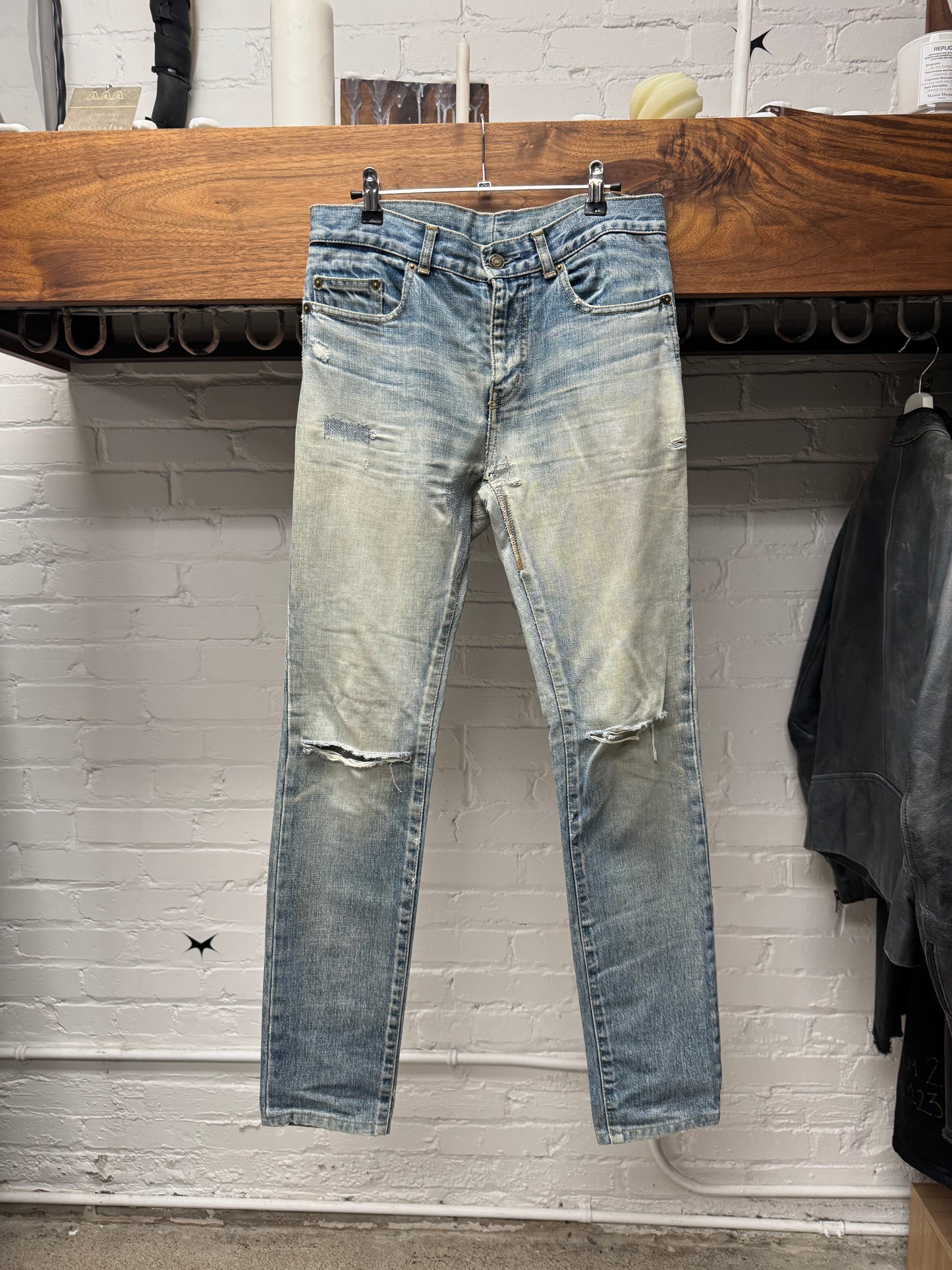 Saint Laurent ‘D02’ Distressed Light Wash Blue Skinny Jeans