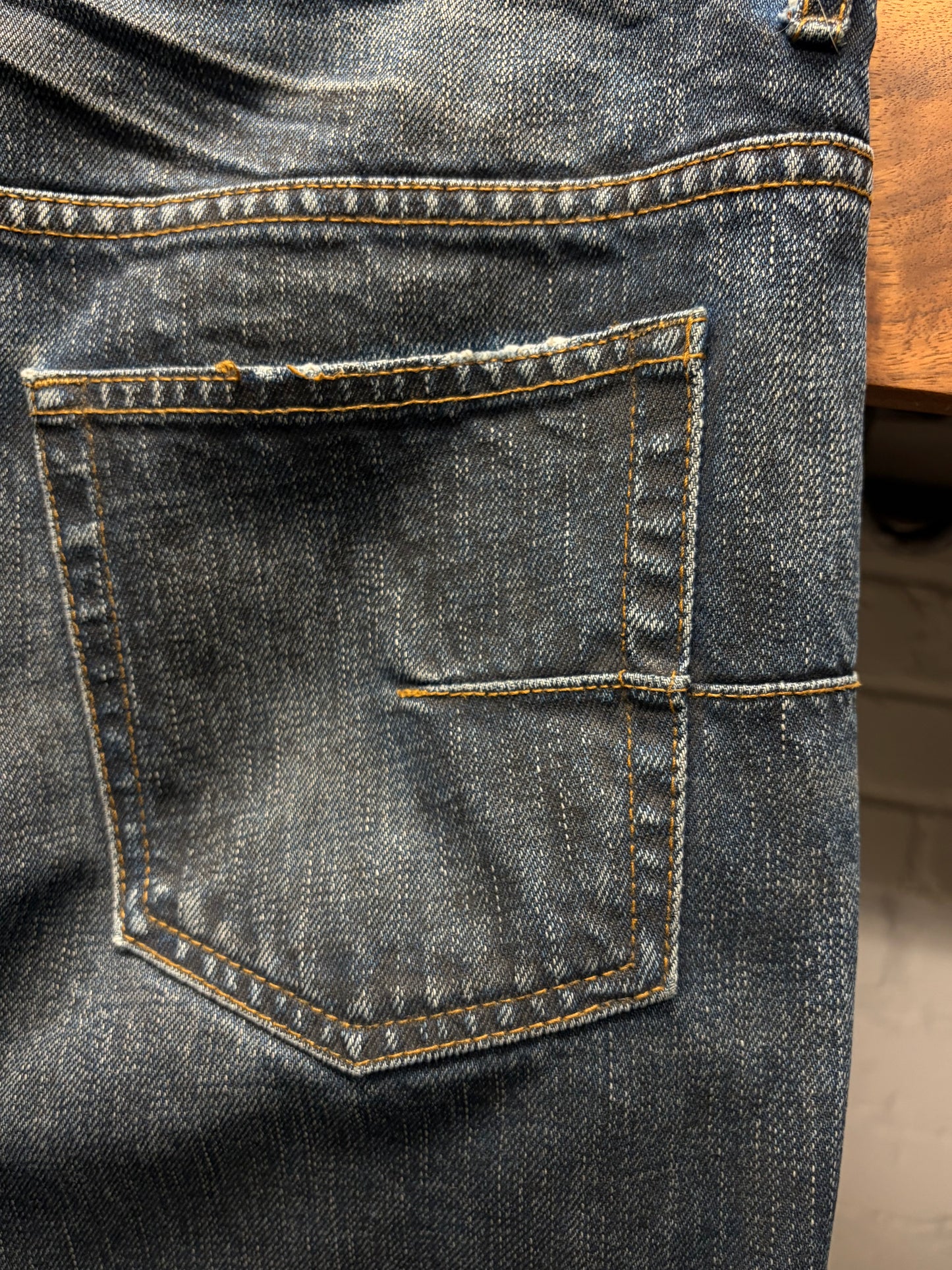 Dior Homme ‘Clawmark’ Raw Blue Skinny Jeans Black Wax Coating