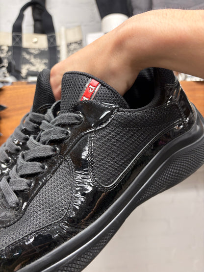 Prada ‘Americas Cup’ Black Patent Leather Low Top Sneakers