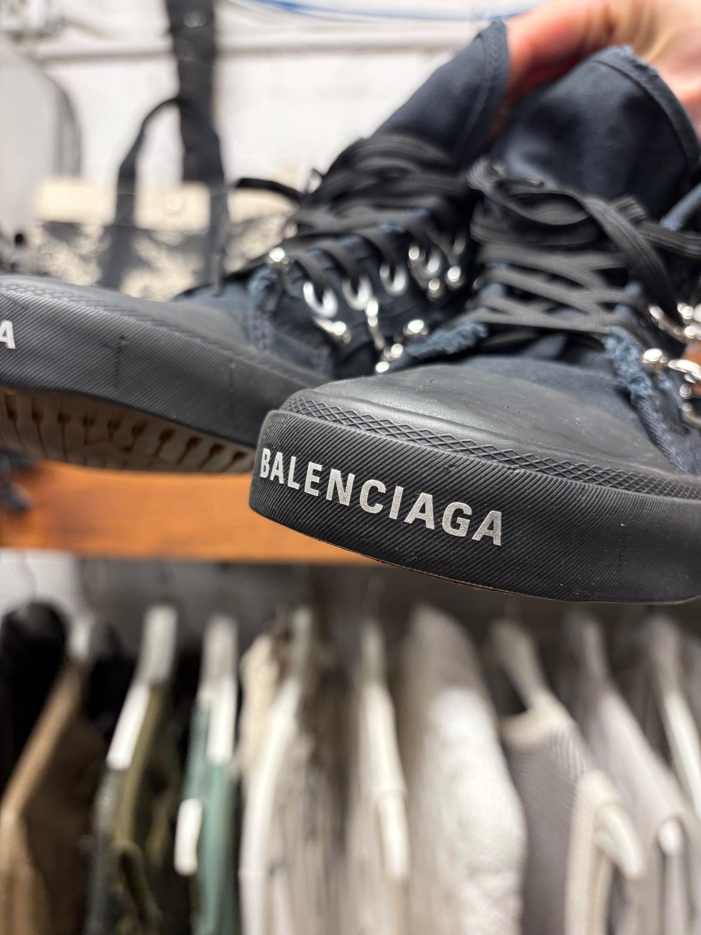 Balenciaga ‘Paris’ Pierced Black Canvas High Top Sneakers