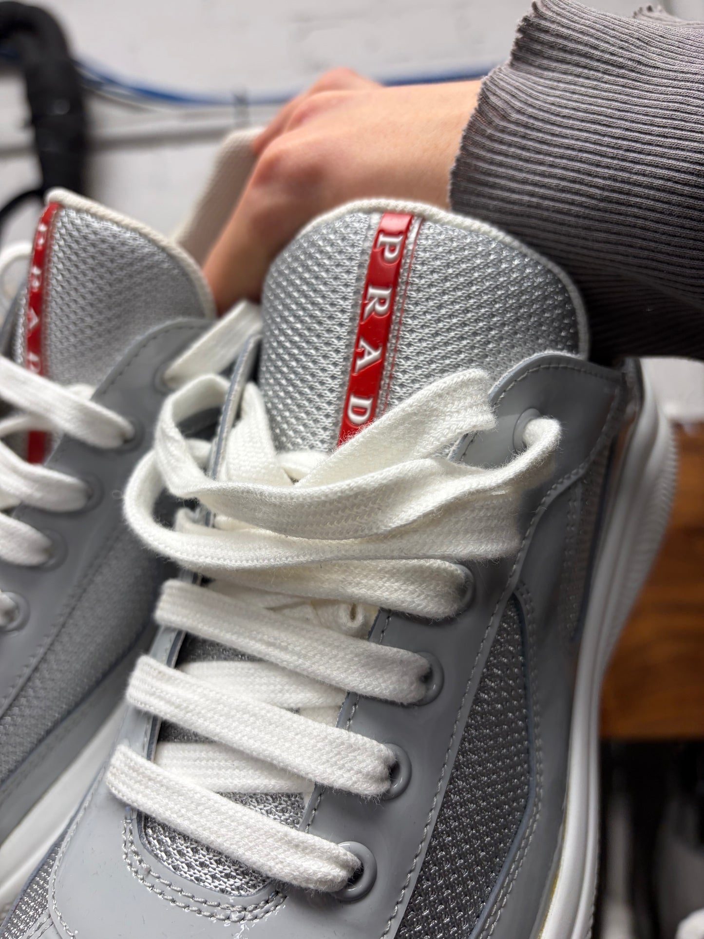 Prada ‘America’s Cup’ Grey/White Patent Leather Low Top Sneakers