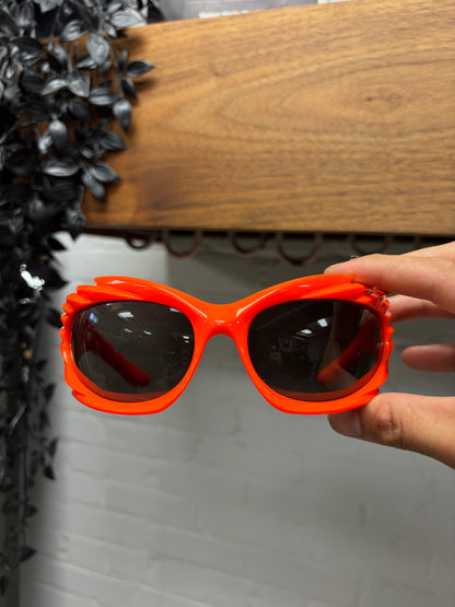 Balenciaga ‘Spike’ Orange Wraparound Sunglasses