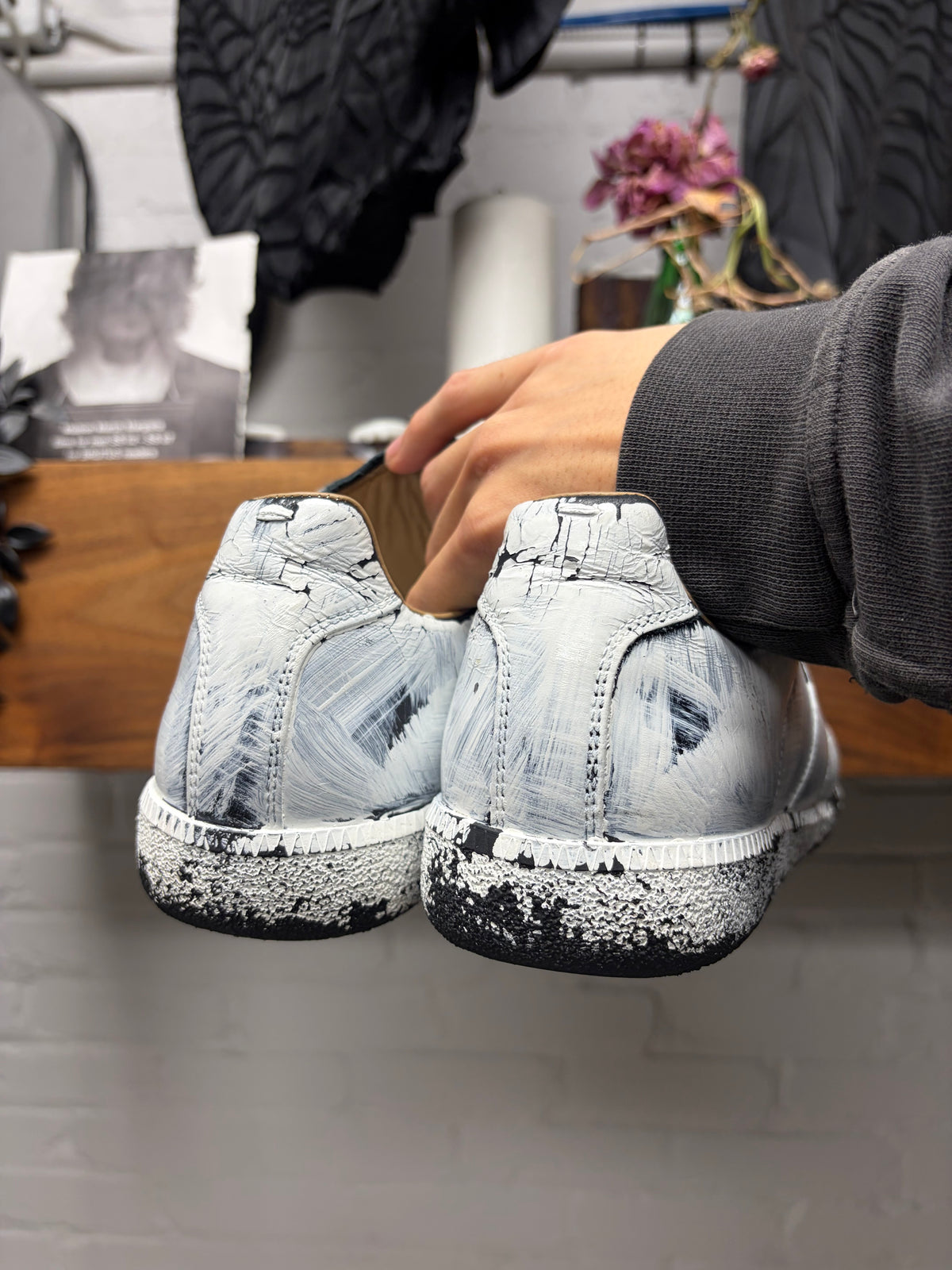 Maison Margiela White Paint Coated ‘G.A.T’ Black Leather Low Top Sneakers