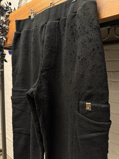 1017 Alyx 9SM ‘Needle Punched’ Black Treated Wide Leg Distressed Cotton Sweatpants