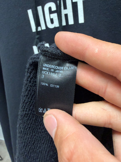 Undercover ‘Light in the Shadow’ Black/White Slogan Hoodie