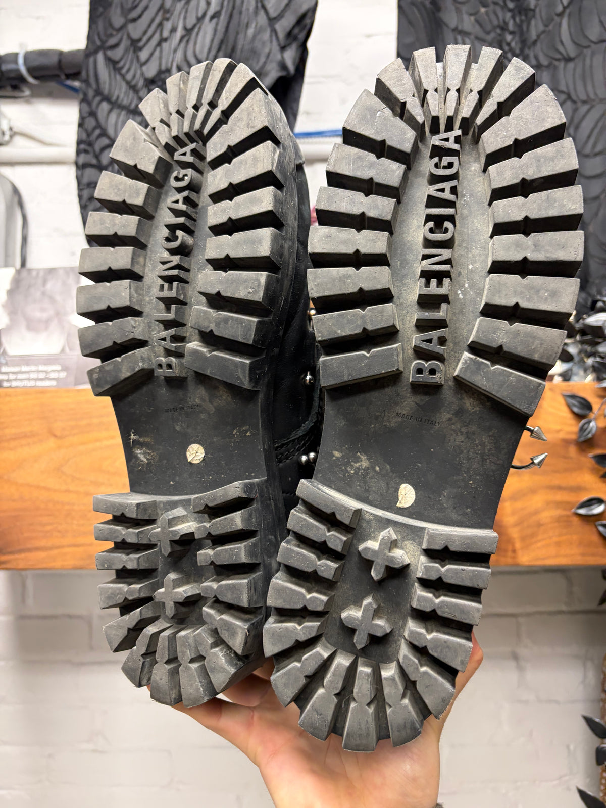 Balenciaga ‘Strike’ Piercing Distressed Black Leather Combat Boots