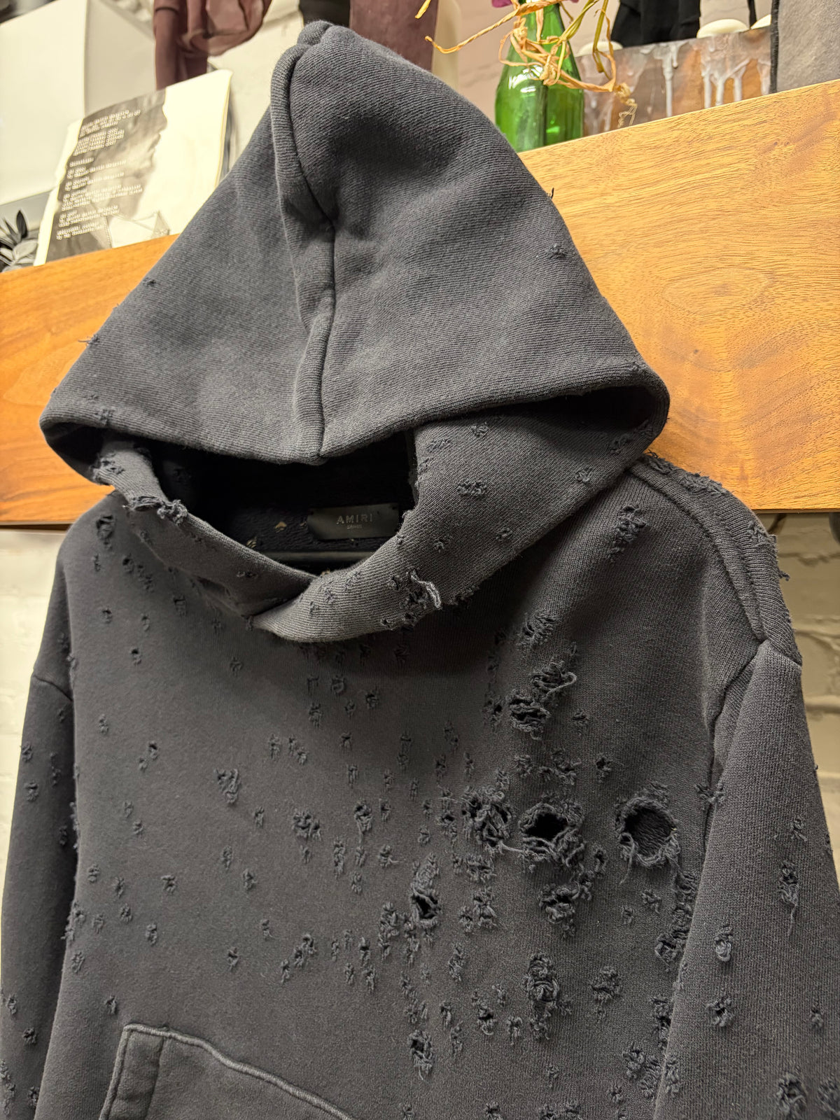 Amiri ‘Gunshot’ Cropped Cashmere Thrash Distressed Black Hoodie