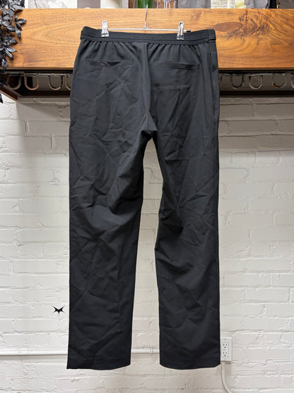 1017 Alyx 9SM ‘Roller Buckle Belt’ Black Wide Leg Trousers