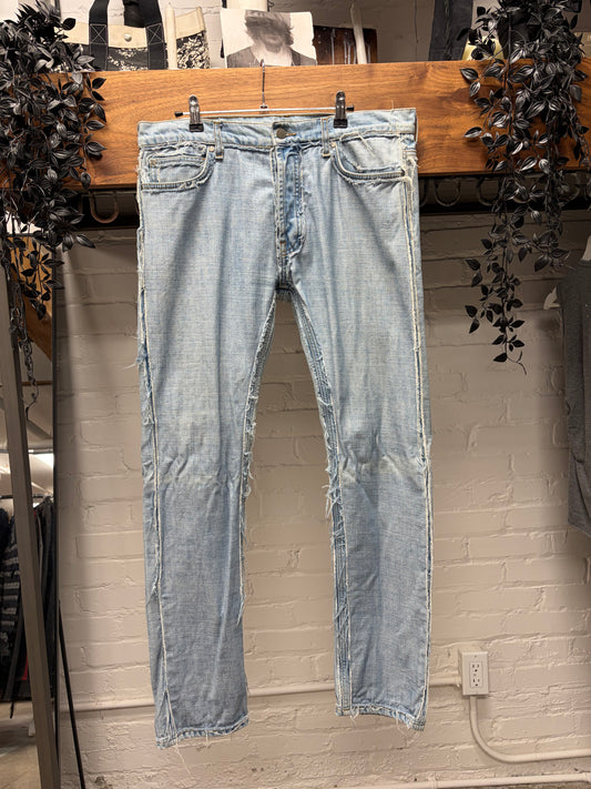 2012 Maison Margiela x H&M ‘Inside Out’ Raw Outseam Light Wash Blue Skinny Jeans