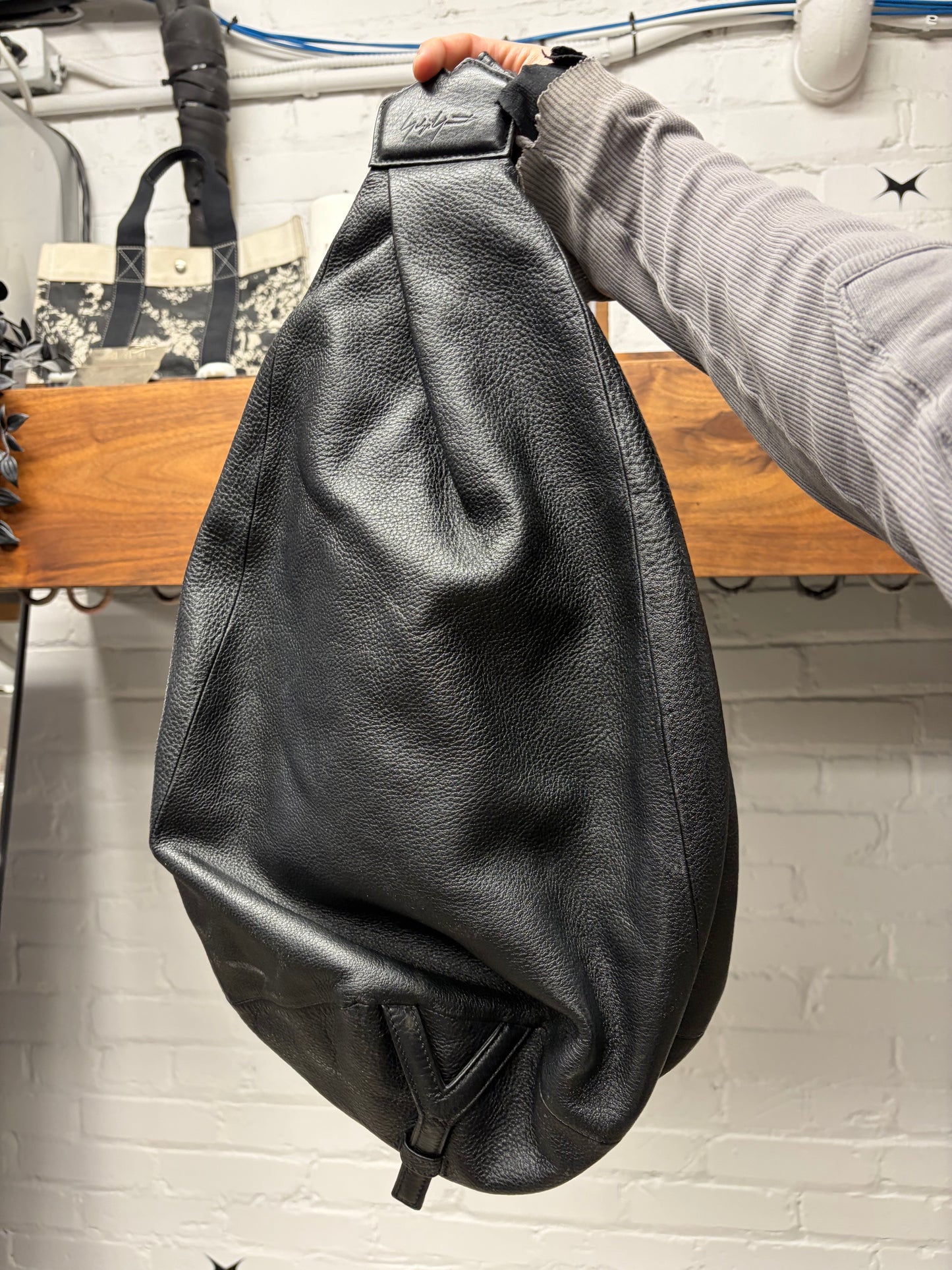 Yohji Yamamoto ‘Discord’ Embossed Black Leather Sling Backpack