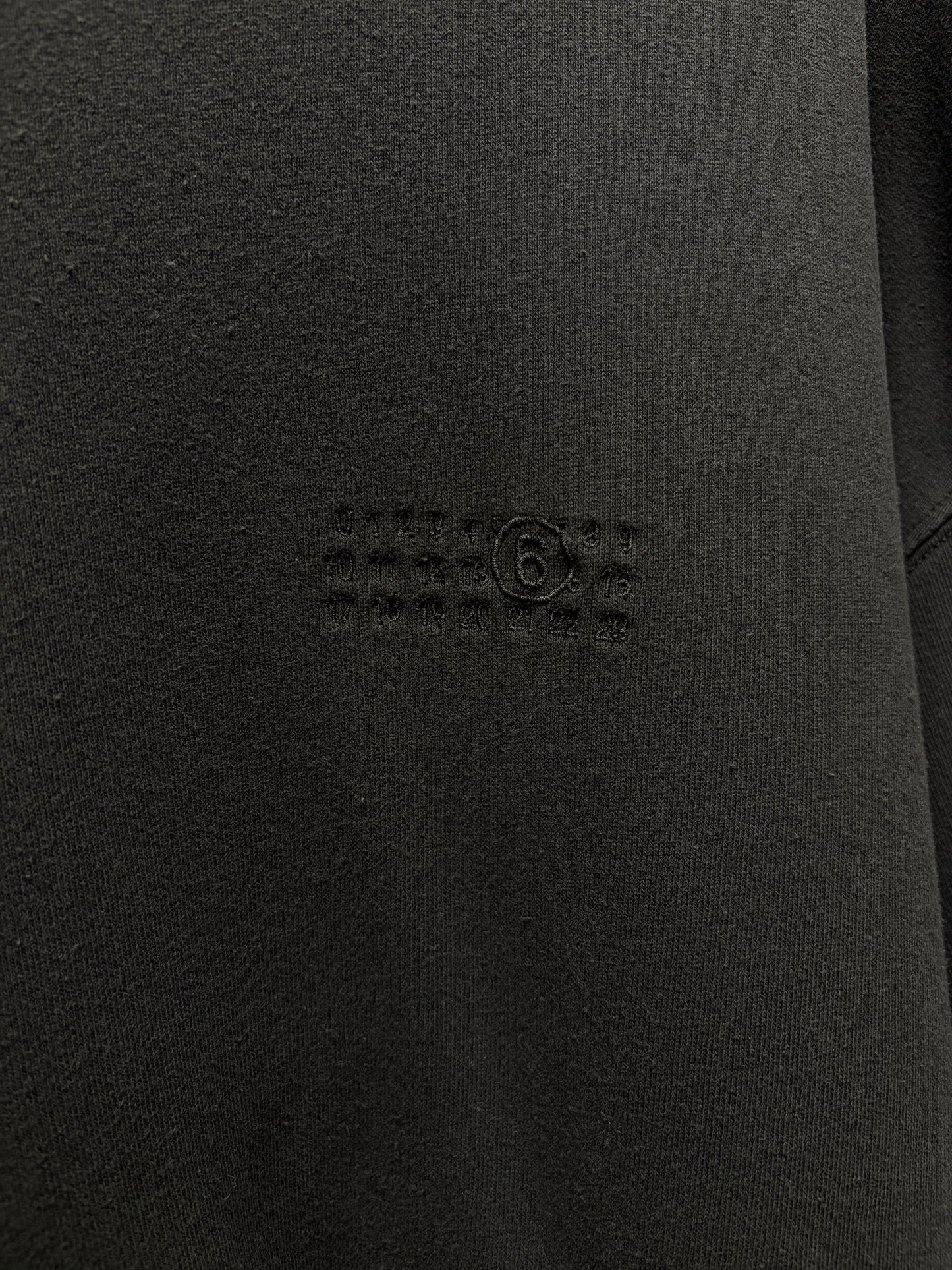 2024 Maison Margiela Distressed Black Raw Hem Embroidered Logo ‘Baseball Sleeve’ Sweatshirt