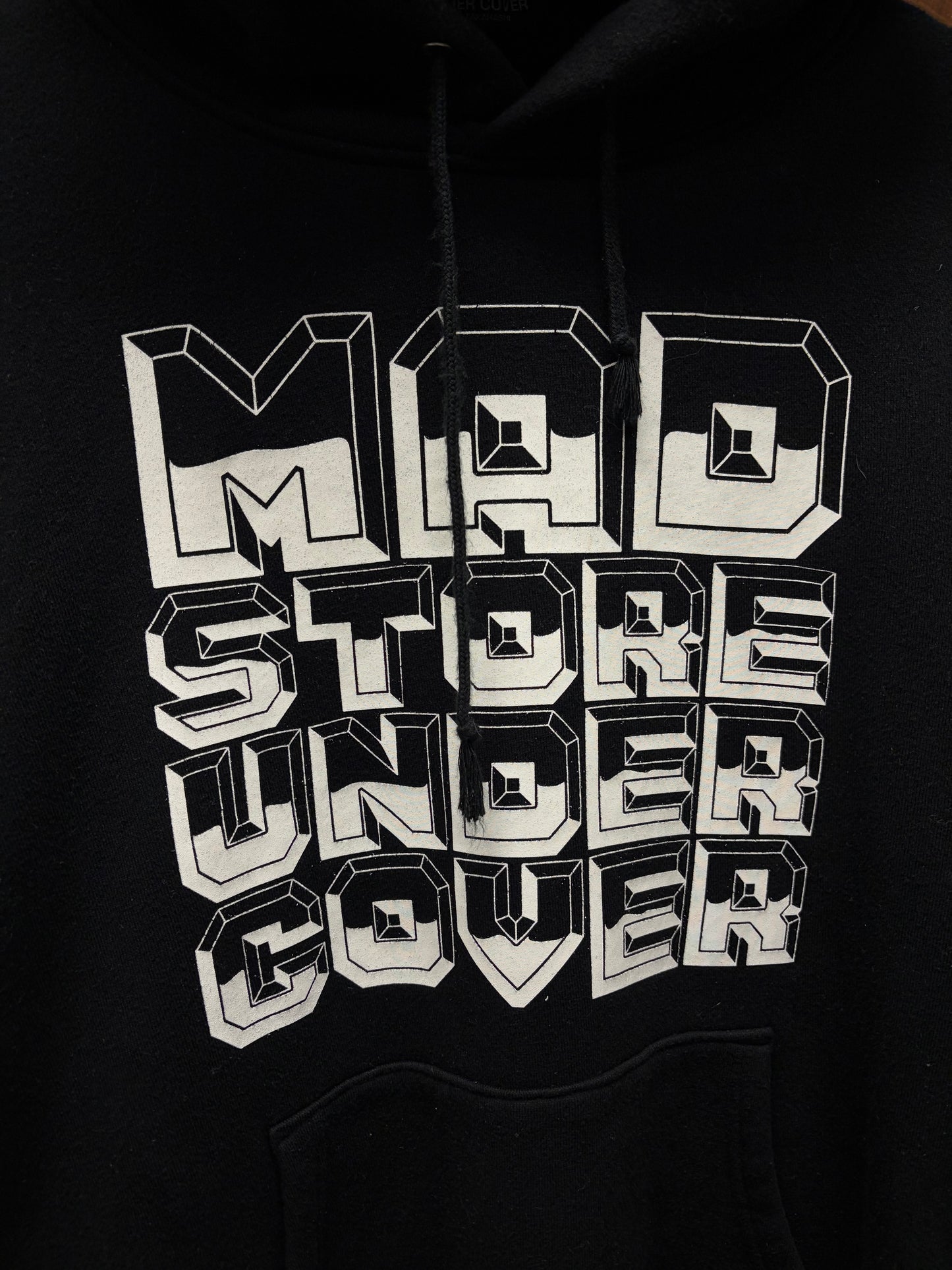 Undercover ‘Madstore’ Black Chest Logo Pullover Hoodie