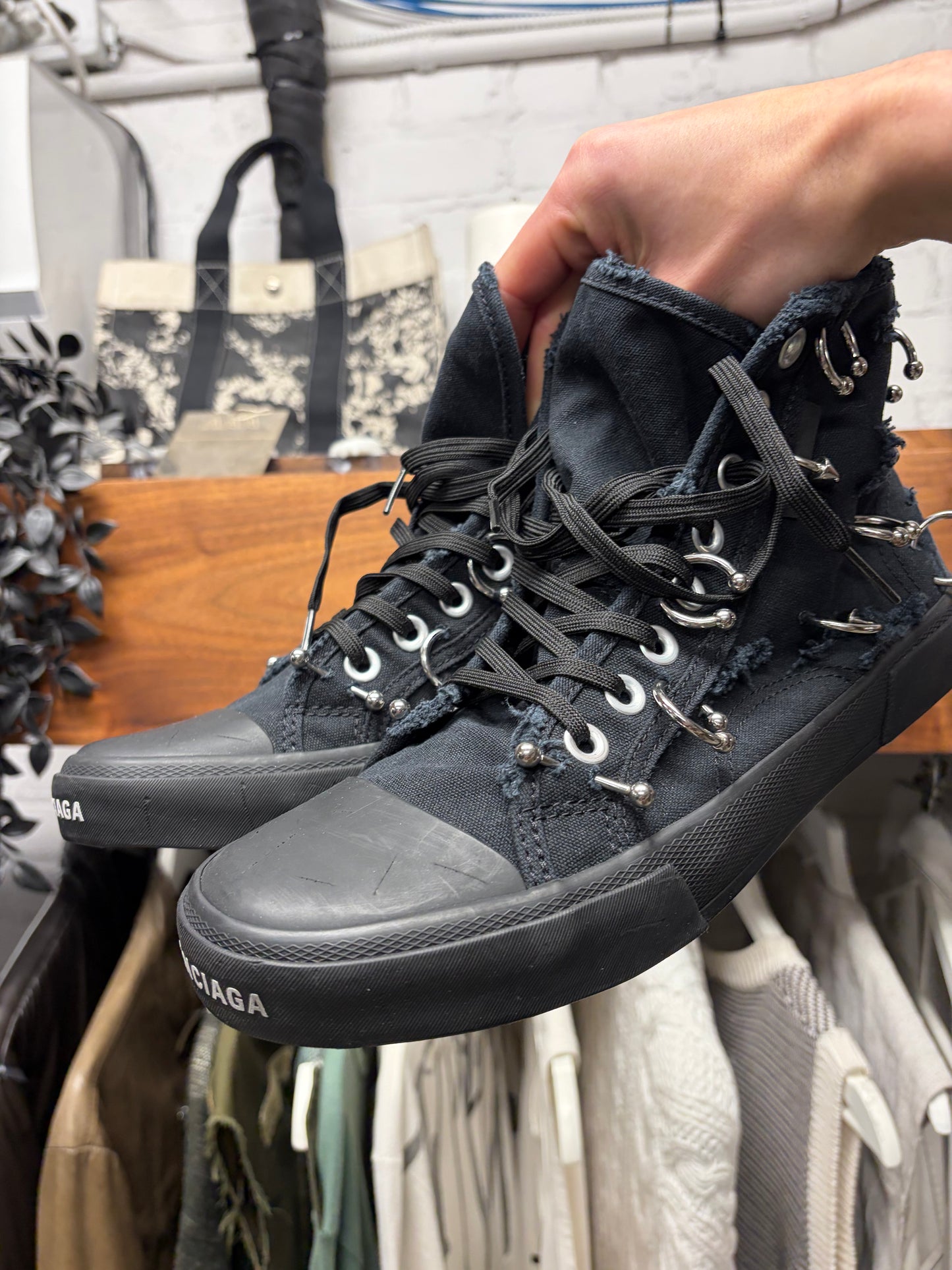 Balenciaga ‘Paris’ Pierced Black Canvas High Top Sneakers