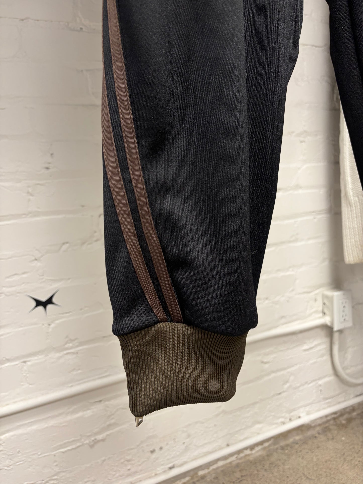 Mihara Yasuhiro ‘Twisted’ Black/Brown Striped Track Pants