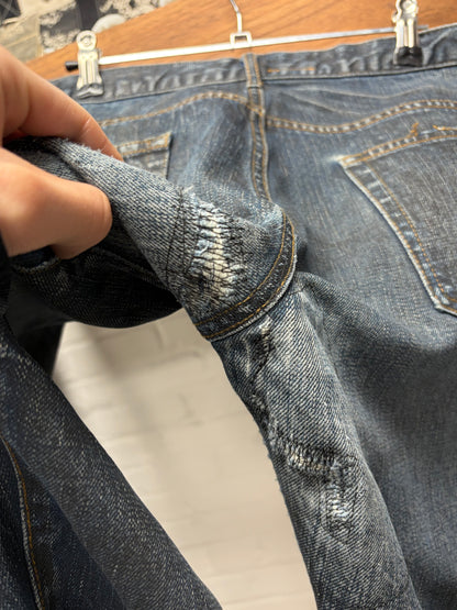 Dior Homme ‘Clawmark’ Raw Blue Skinny Jeans Black Wax Coating