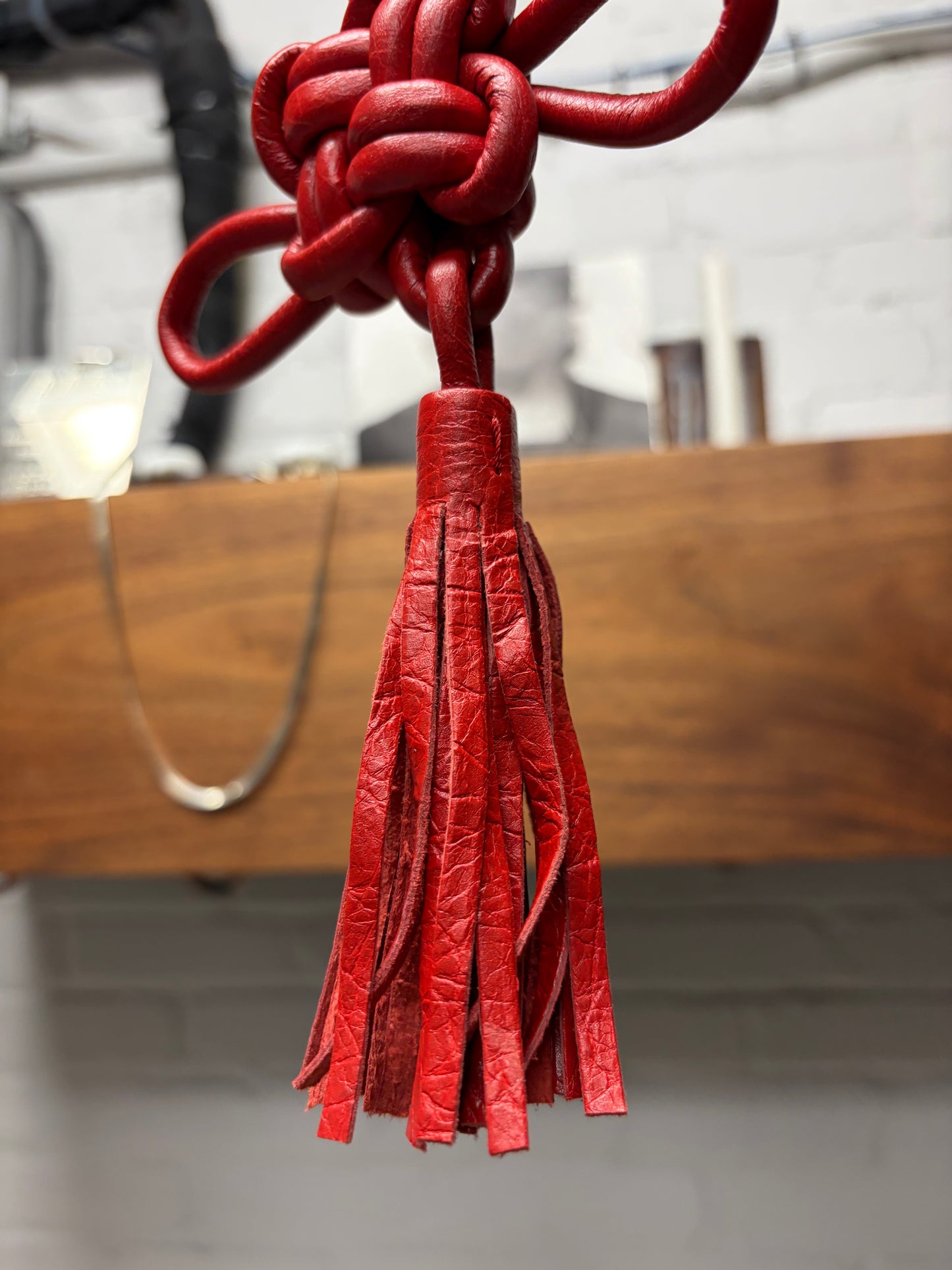 Balenciaga ‘Coin Knot’ Woven Leather Tassel Keychain