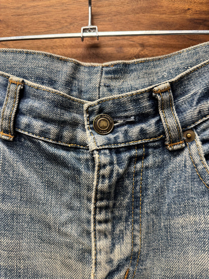 Saint Laurent ‘D02’ Distressed Light Wash Blue Skinny Jeans