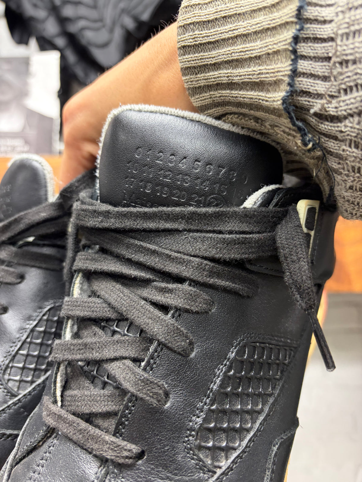 Maison Margiela ‘DDSTK’ Black/Red Leather High Top Sneakers