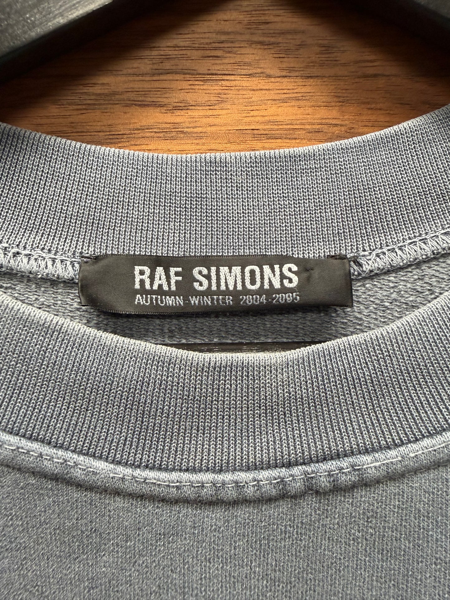 AW2004 Raf Simons ‘Waves’ Shipwrecked Faded Blue Sweatshirt