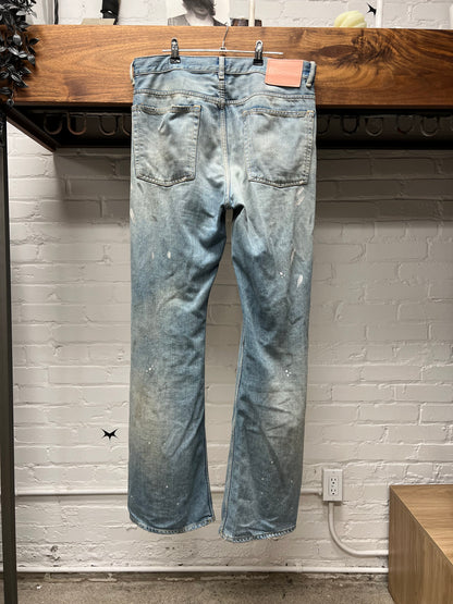 Acne Studios ‘Paint Splatter’ Light Wash Blue Flared Denim
