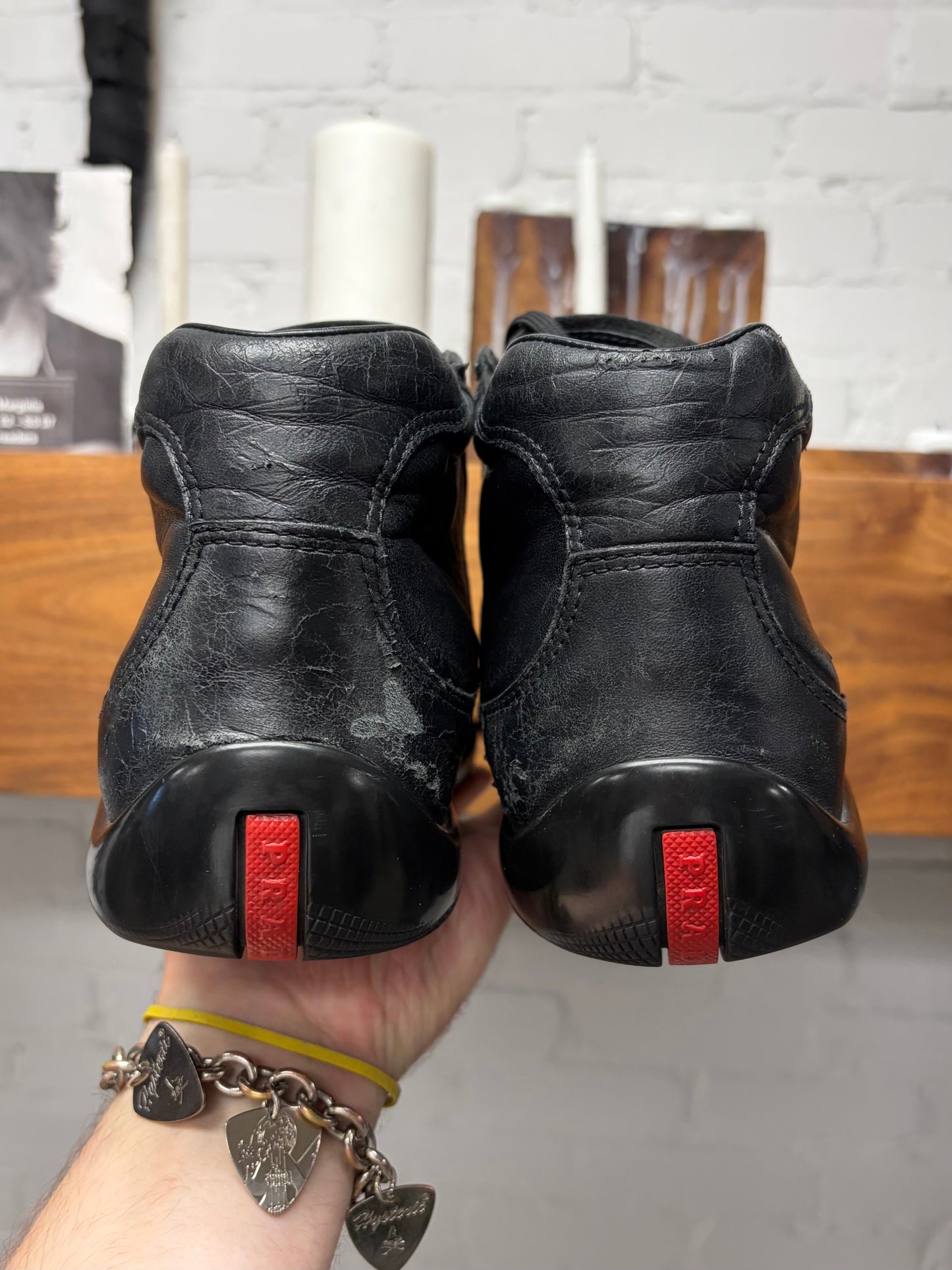Prada ‘Americas Cup’ Black Leather High Top Sneakers