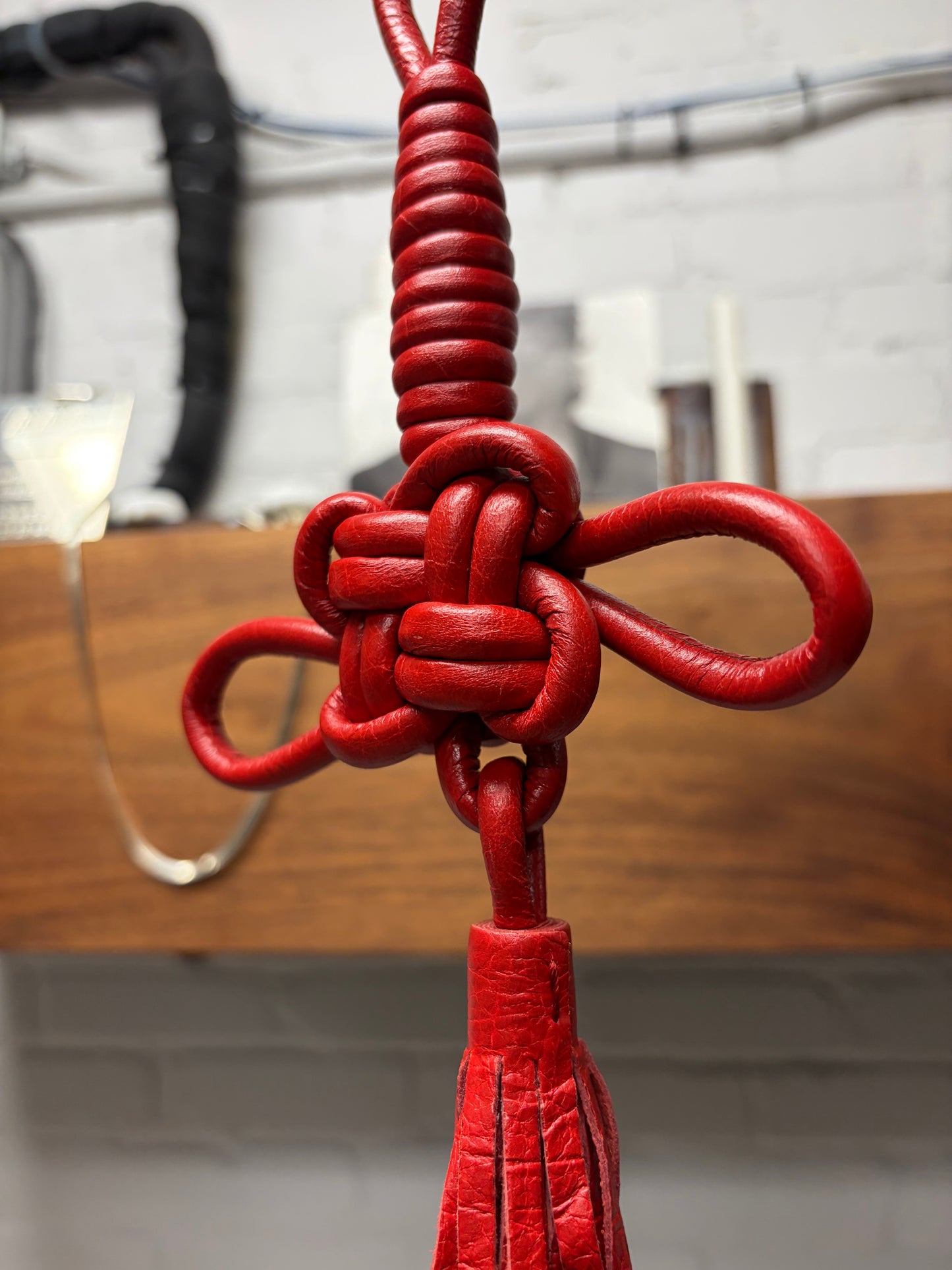 Balenciaga ‘Coin Knot’ Woven Leather Tassel Keychain