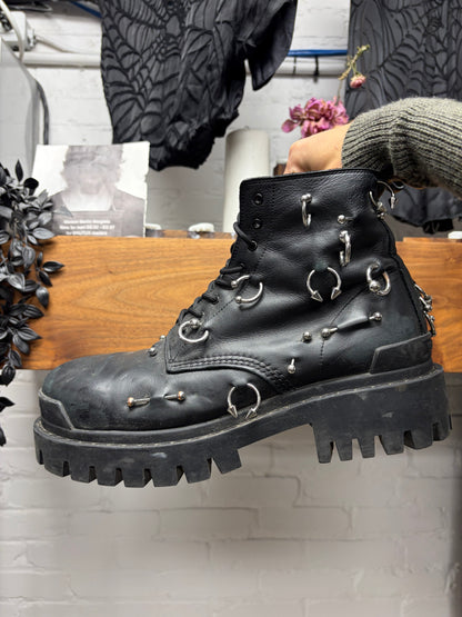 Balenciaga ‘Strike’ Piercing Distressed Black Leather Combat Boots