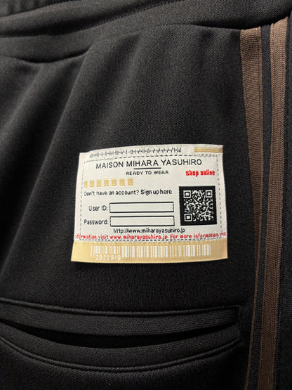 Mihara Yasuhiro ‘Twisted’ Black/Brown Striped Track Pants
